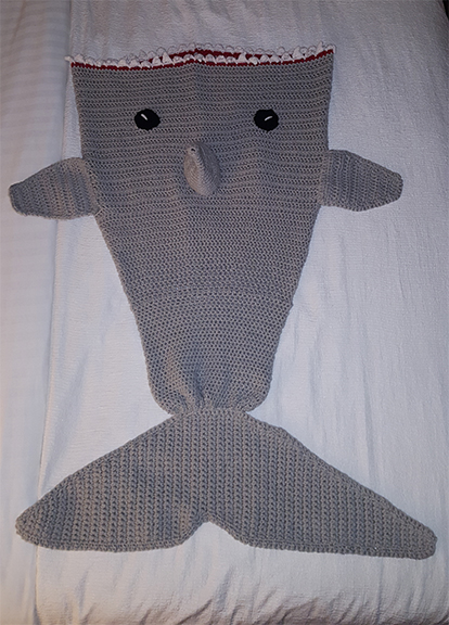 crocheted child's shark blanket