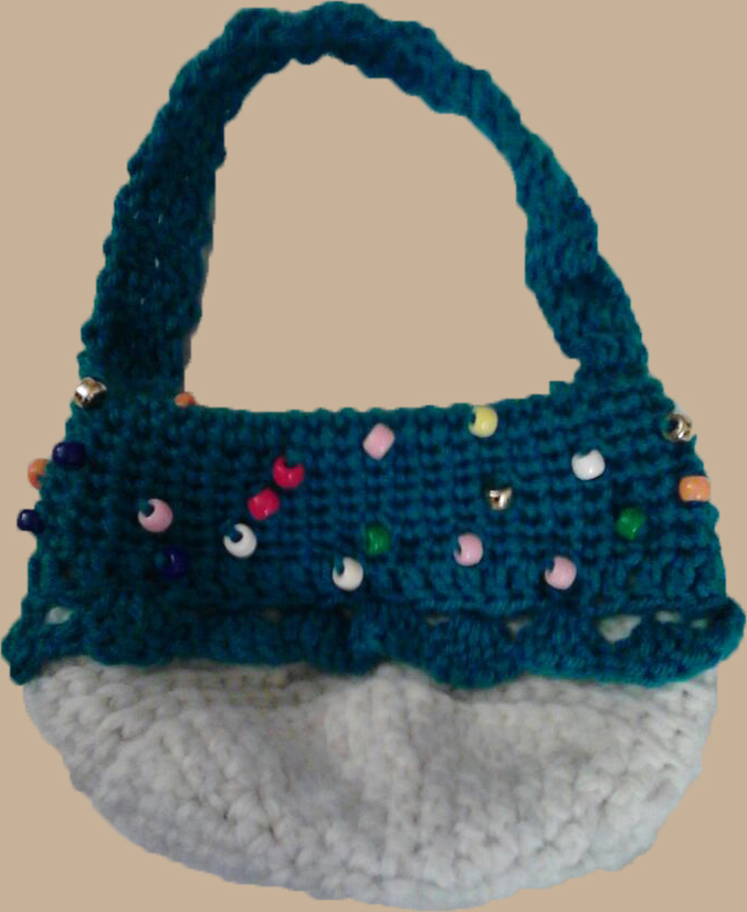 white crocheted bottom with blue crocheted icing and handle cupcake purse with securely sewn on beads as sprinkles